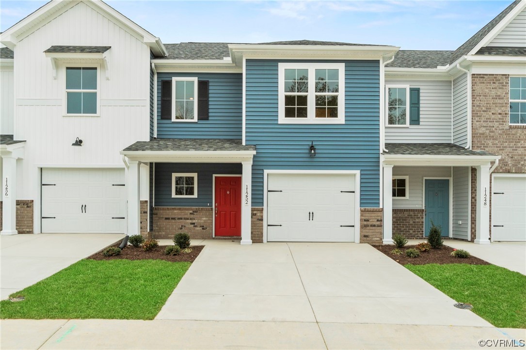 a front view of house with yard