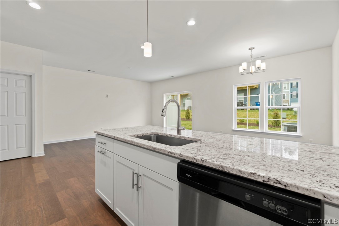 11252 Benton Pointe Way Chester, VA 23831 - Photo 12 of 26 a kitchen with granite countertop kitchen island a sink and a window