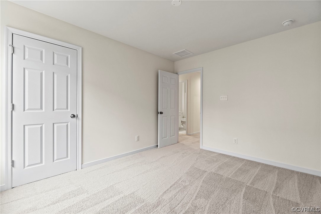 11252 Benton Pointe Way Chester, VA 23831 - Photo 22 of 26 an empty room with windows