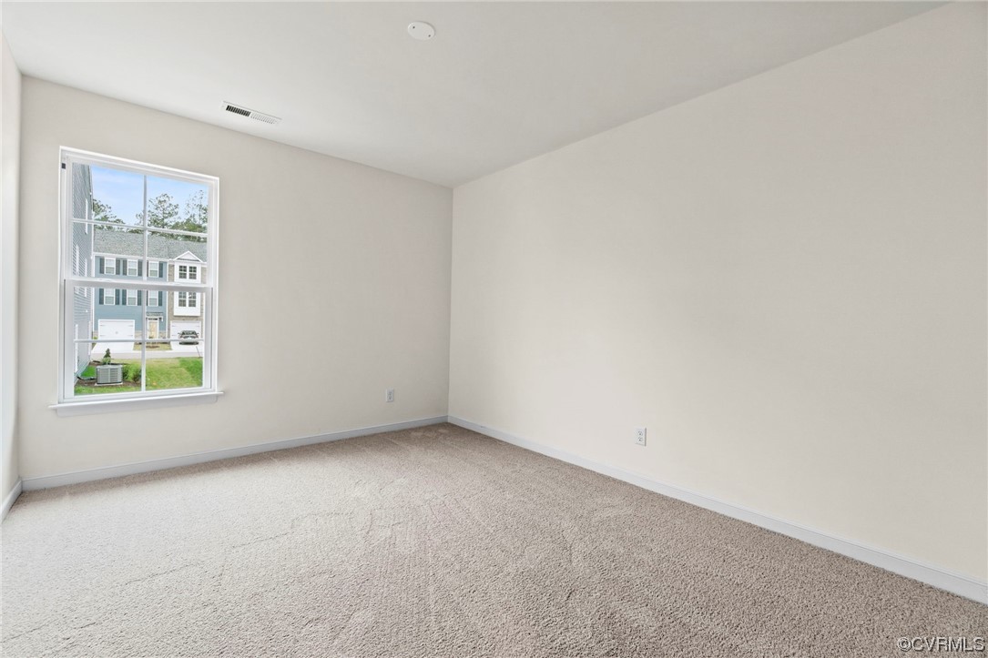 11252 Benton Pointe Way Chester, VA 23831 - Photo 24 of 26 a view of an empty room with a window