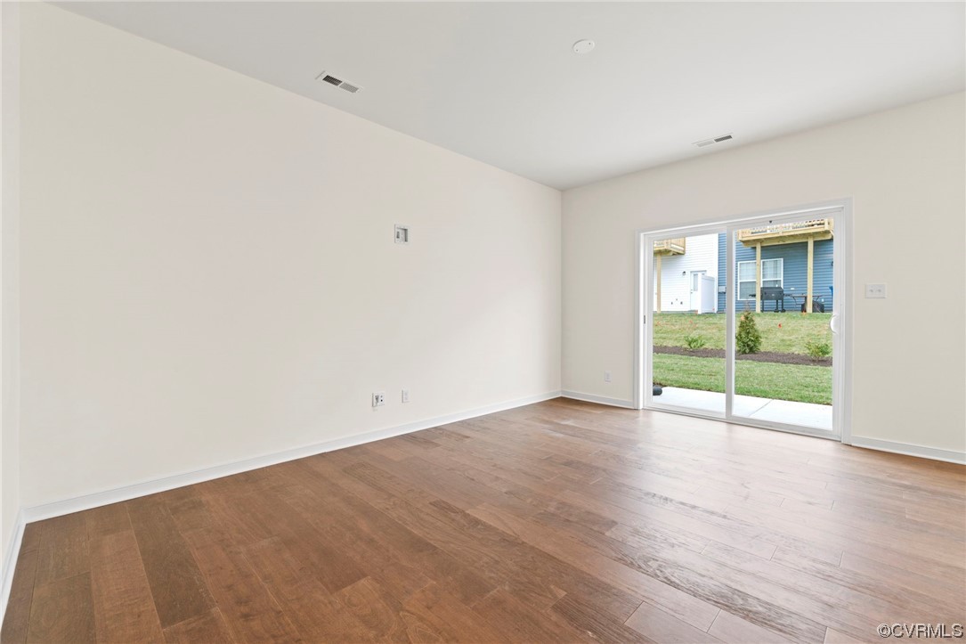 11252 Benton Pointe Way Chester, VA 23831 - Photo 5 of 26 a view of an empty room with wooden floor