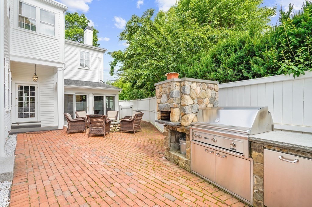 235 Main Street Hingham, MA 02043 - Photo 18 of 36 a view of a terrace with seating area