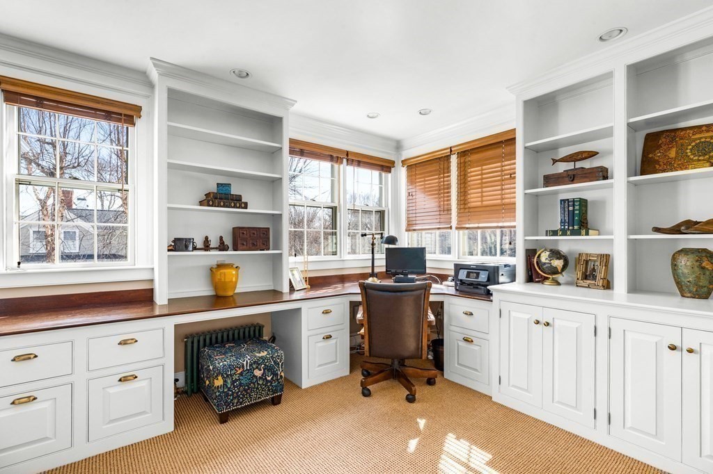 235 Main Street Hingham, MA 02043 - Photo 28 of 36 a room with furniture a window and gym equipment