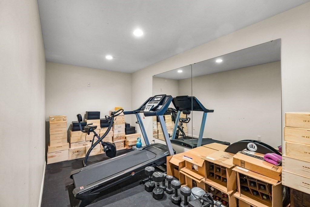 235 Main Street Hingham, MA 02043 - Photo 31 of 36 a room with gym equipment