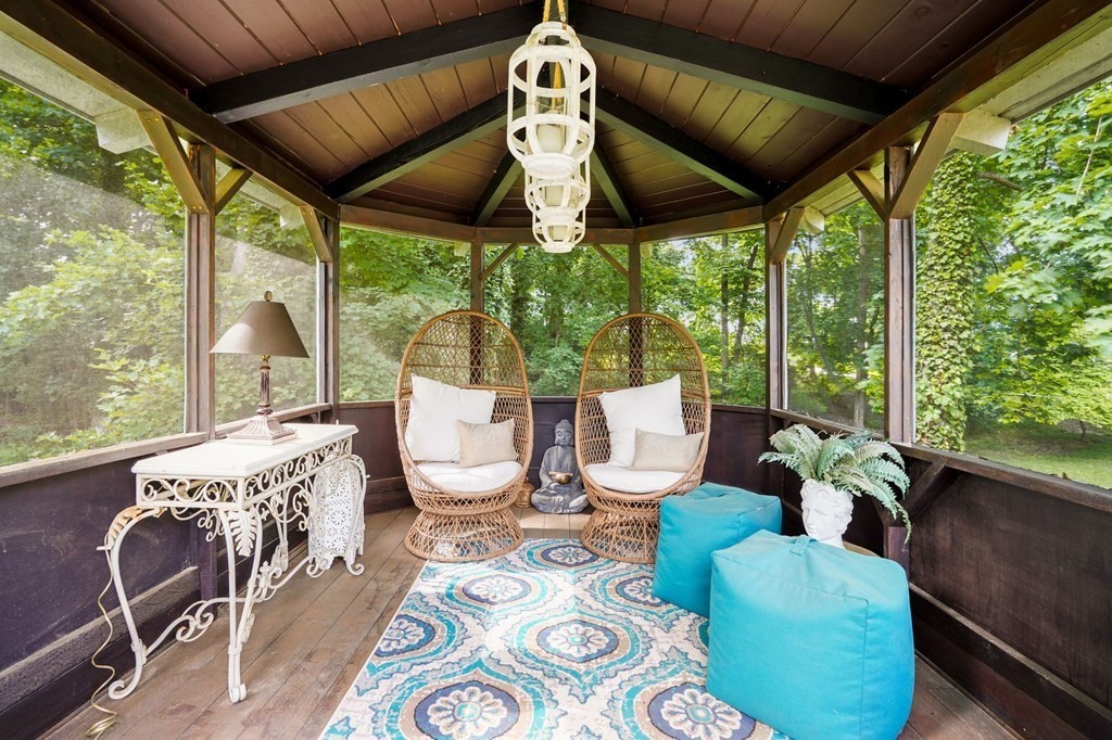 235 Main Street Hingham, MA 02043 - Photo 33 of 36 a living room with furniture and a large window