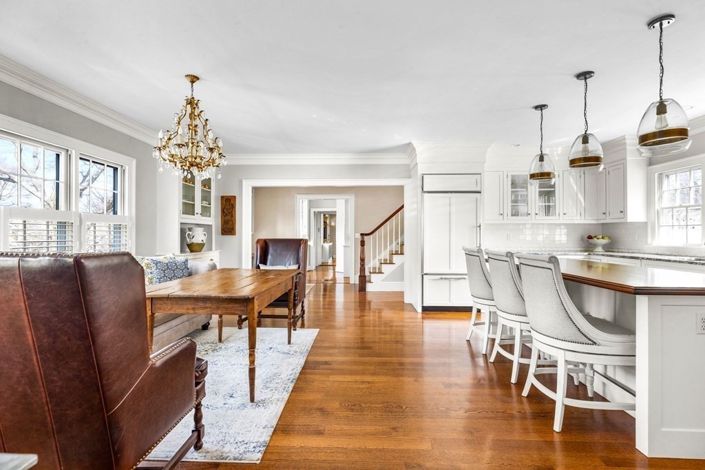 235 Main Street Hingham, MA 02043 - Photo 8 of 36 a view of a dining room with furniture window and wooden floor
