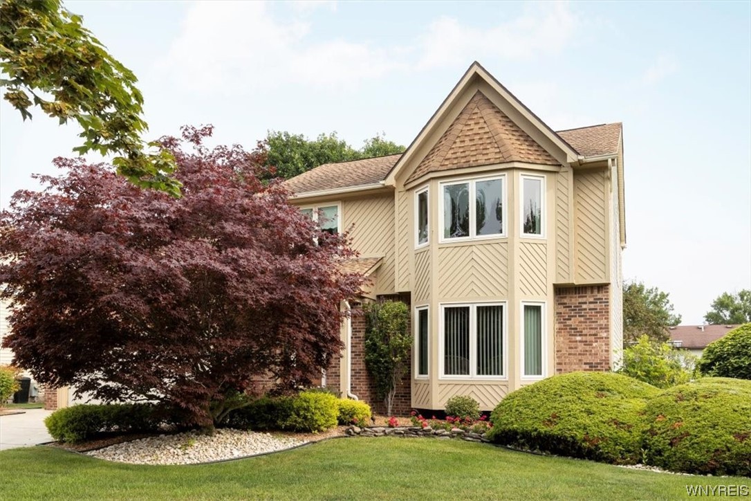 Welcome to 221 Rambling Road, East Amherst!