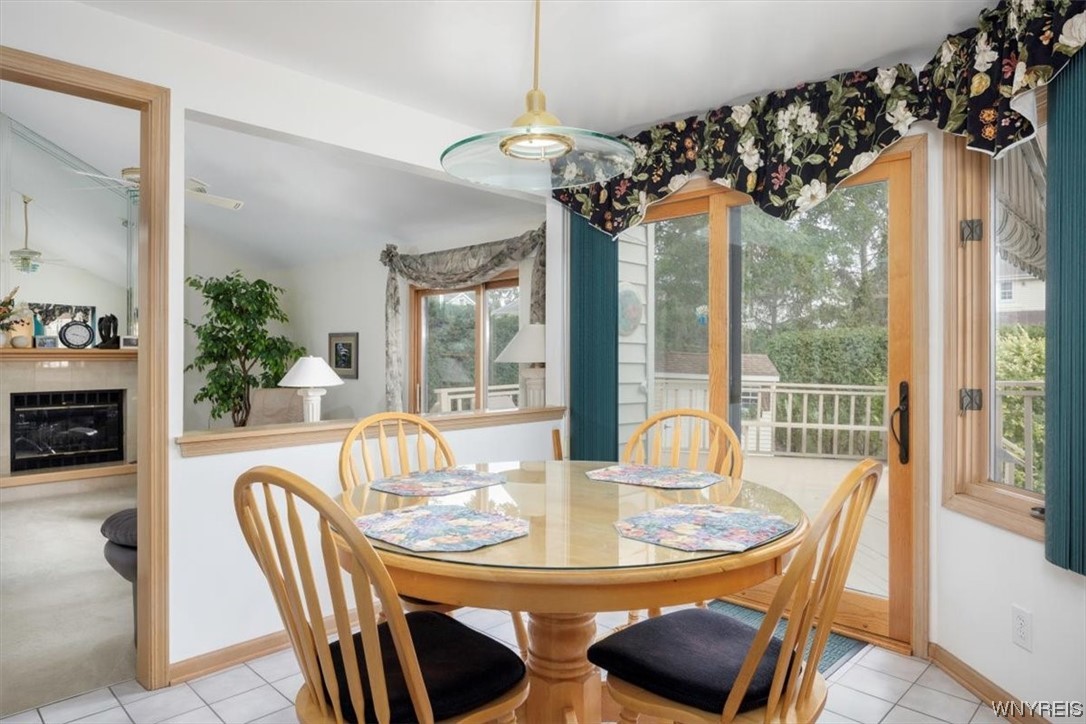 221 Rambling Road Amherst, NY 14051 - Photo 11 of 33 View of the eat-in area, and the slider to the dec