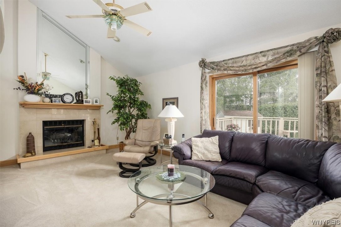 221 Rambling Road Amherst, NY 14051 - Photo 12 of 33 Step down into the Family Room with vaulted ceilin