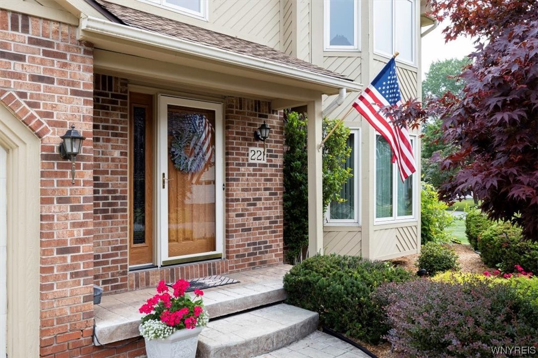 221 Rambling Road Amherst, NY 14051 - Photo 3 of 33 Lovely entranceway with inviting stamped concrete