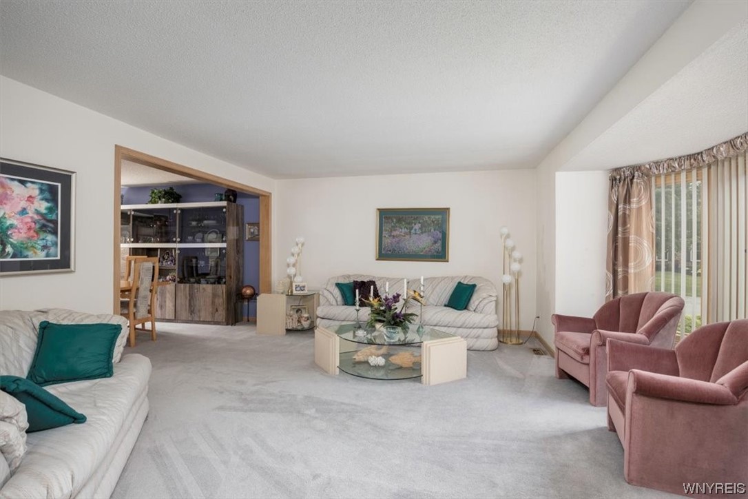 221 Rambling Road Amherst, NY 14051 - Photo 5 of 33 To your right is the light and bright formal Livin