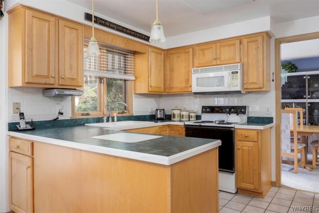 221 Rambling Road Amherst, NY 14051 - Photo 9 of 33 Another view of the Kitchen.
