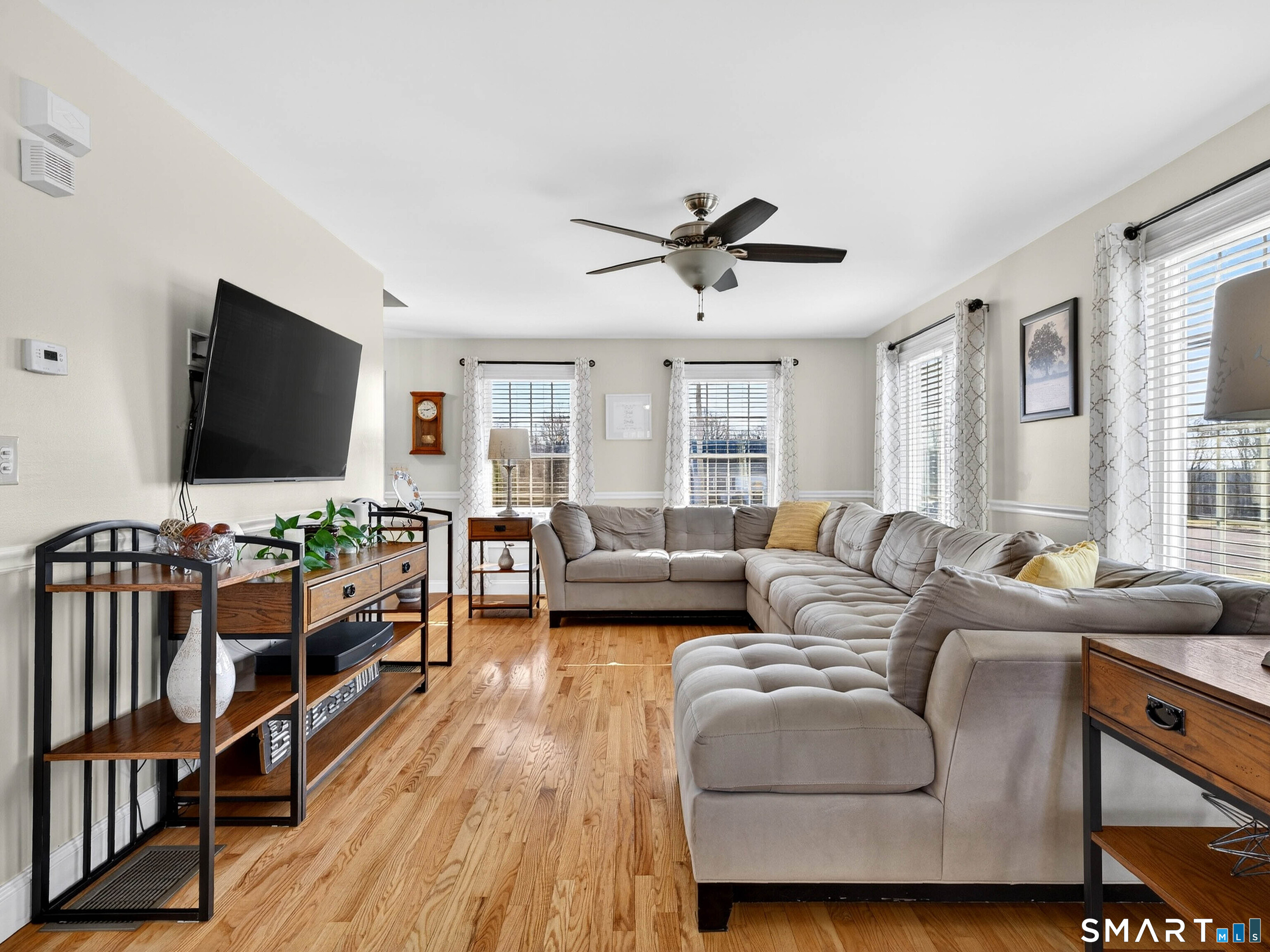 20 Colonial Heights Road East Haven, CT 06473 - Photo 11 of 39 a living room with furniture and a flat screen tv