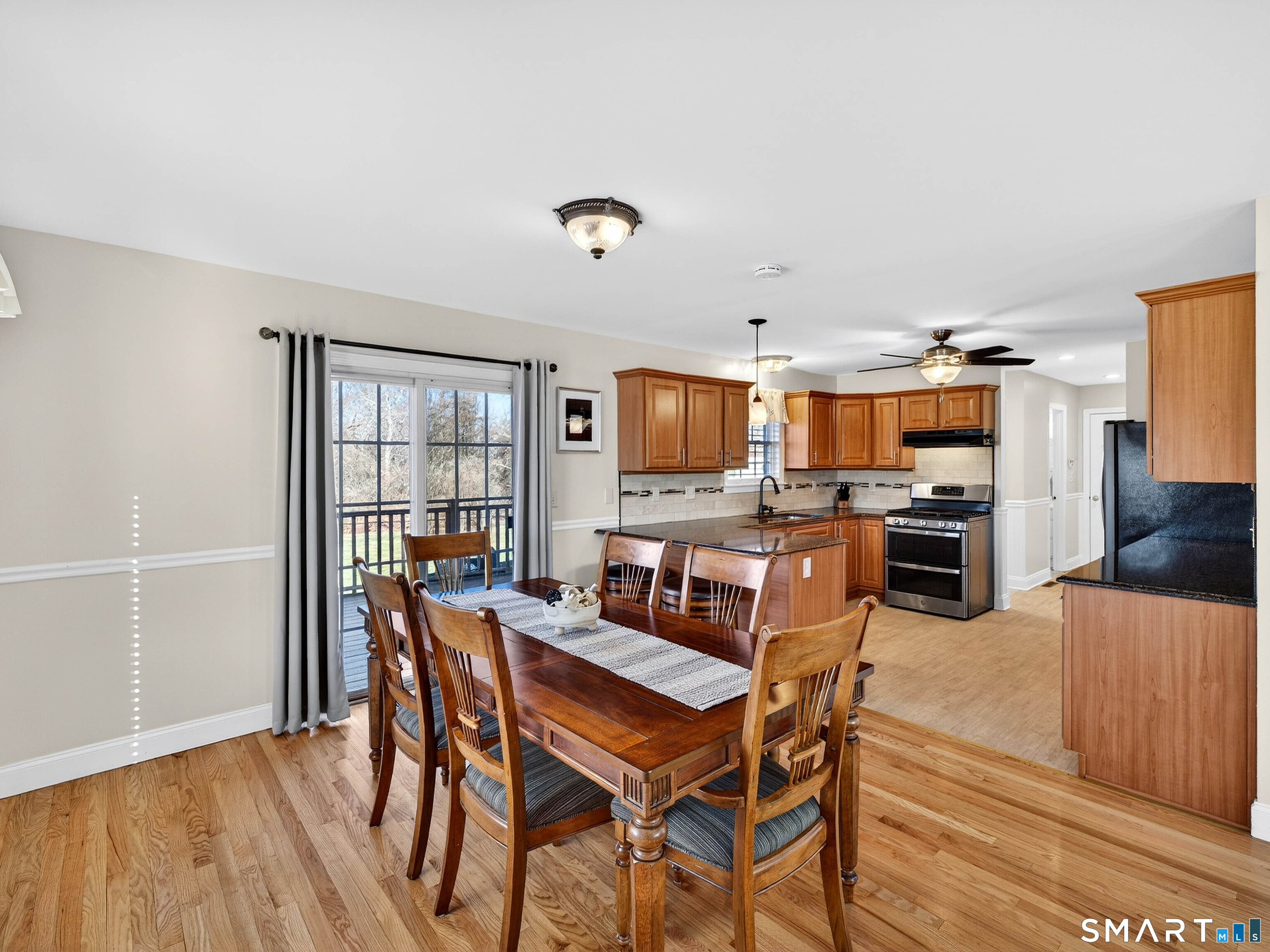 20 Colonial Heights Road East Haven, CT 06473 - Photo 14 of 39 a dining room with furniture and wooden floor
