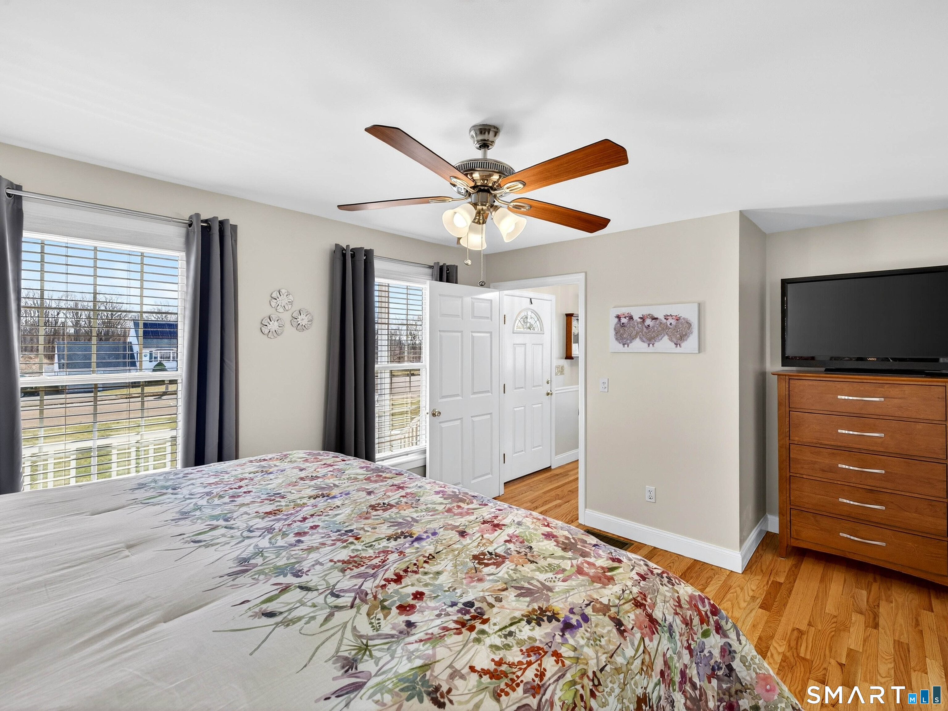 20 Colonial Heights Road East Haven, CT 06473 - Photo 18 of 39 a bedroom with a bed and a flat screen tv