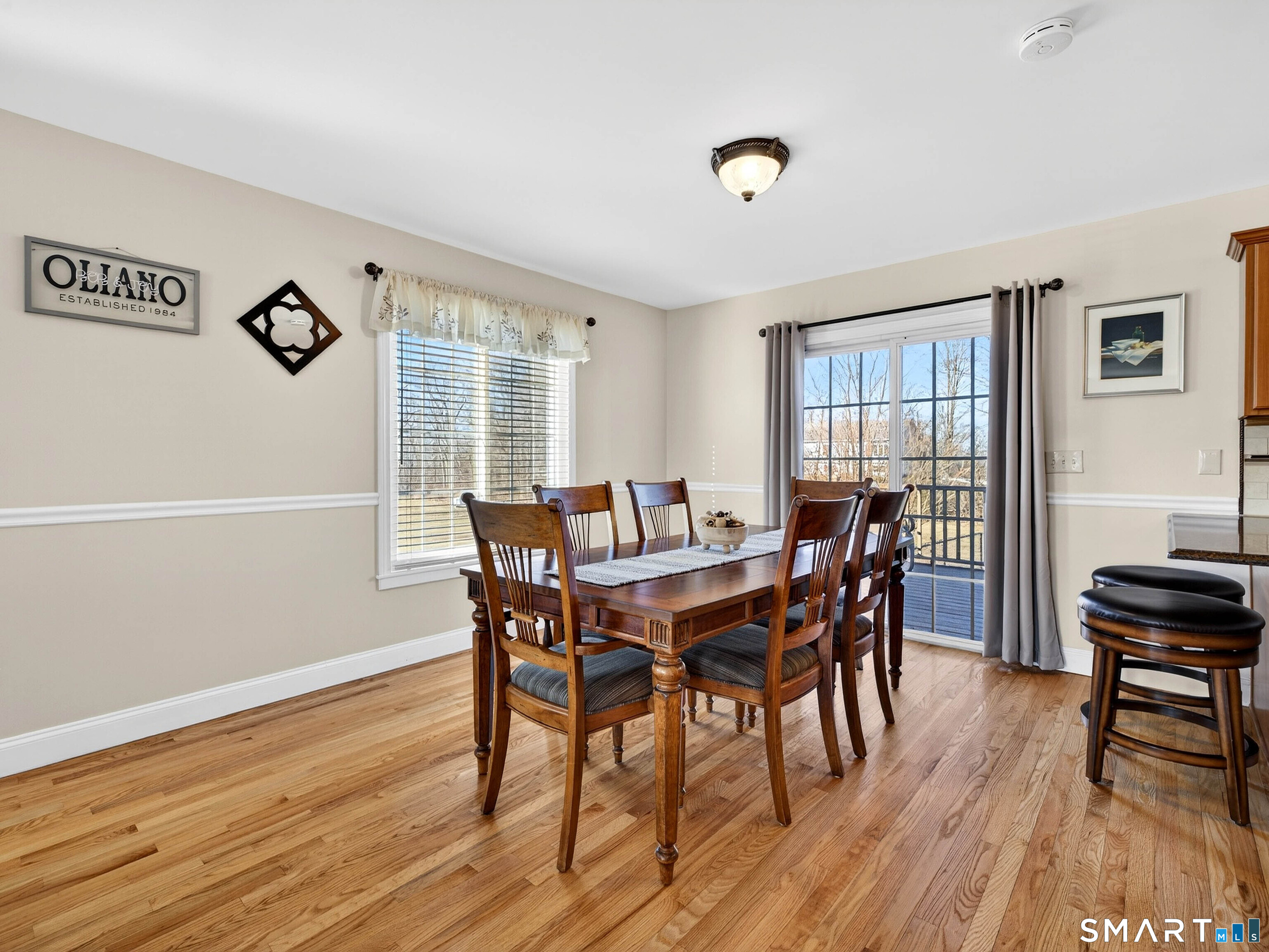 20 Colonial Heights Road East Haven, CT 06473 - Photo 3 of 39 a view of a dining room with furniture and wooden floor