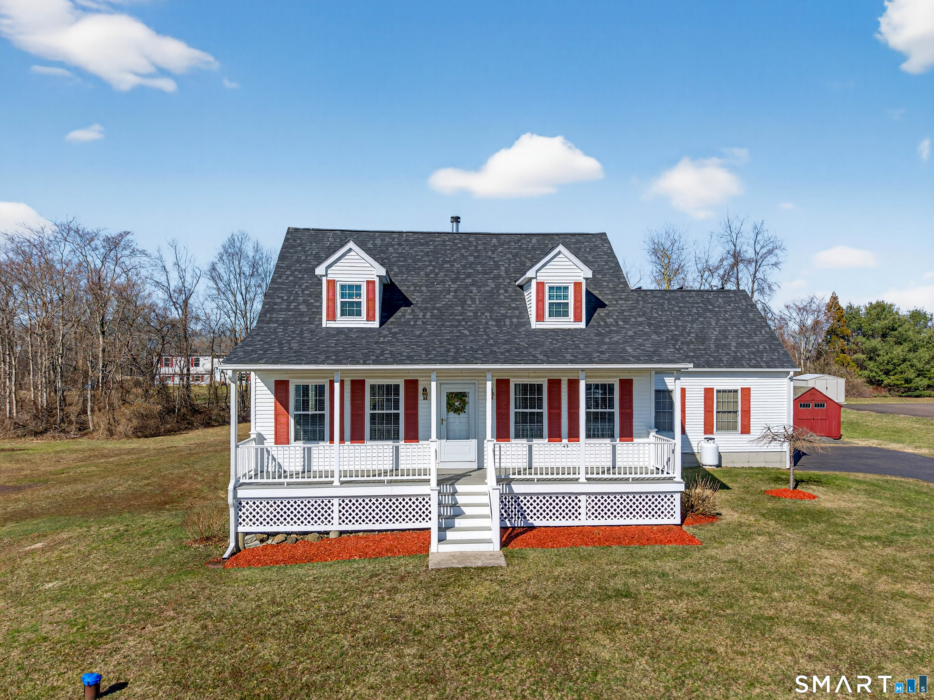 20 Colonial Heights Road East Haven, CT 06473 - Photo 34 of 39 front view of a house with a yard