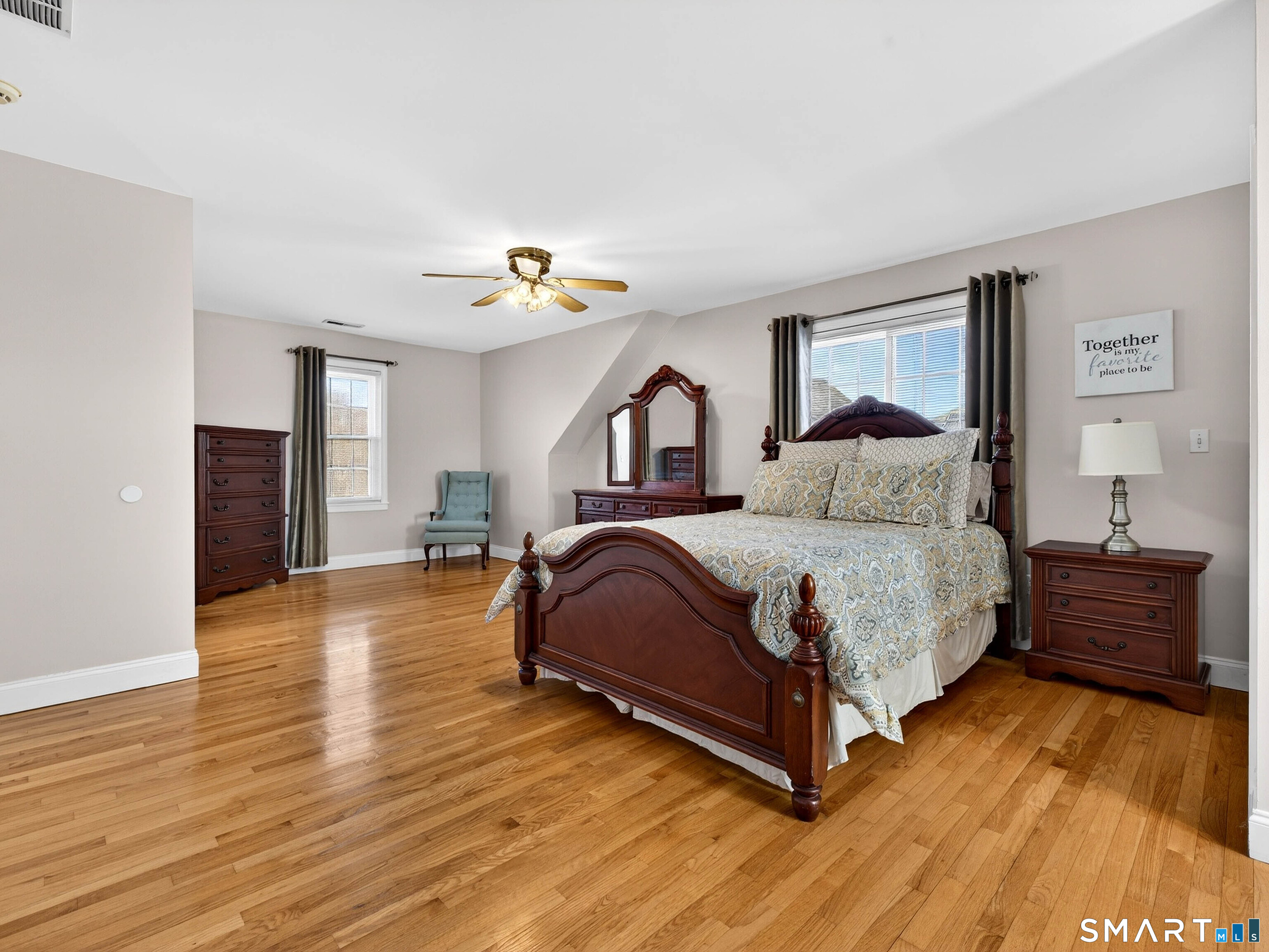 20 Colonial Heights Road East Haven, CT 06473 - Photo 6 of 39 a spacious bedroom with a bed and wooden floor