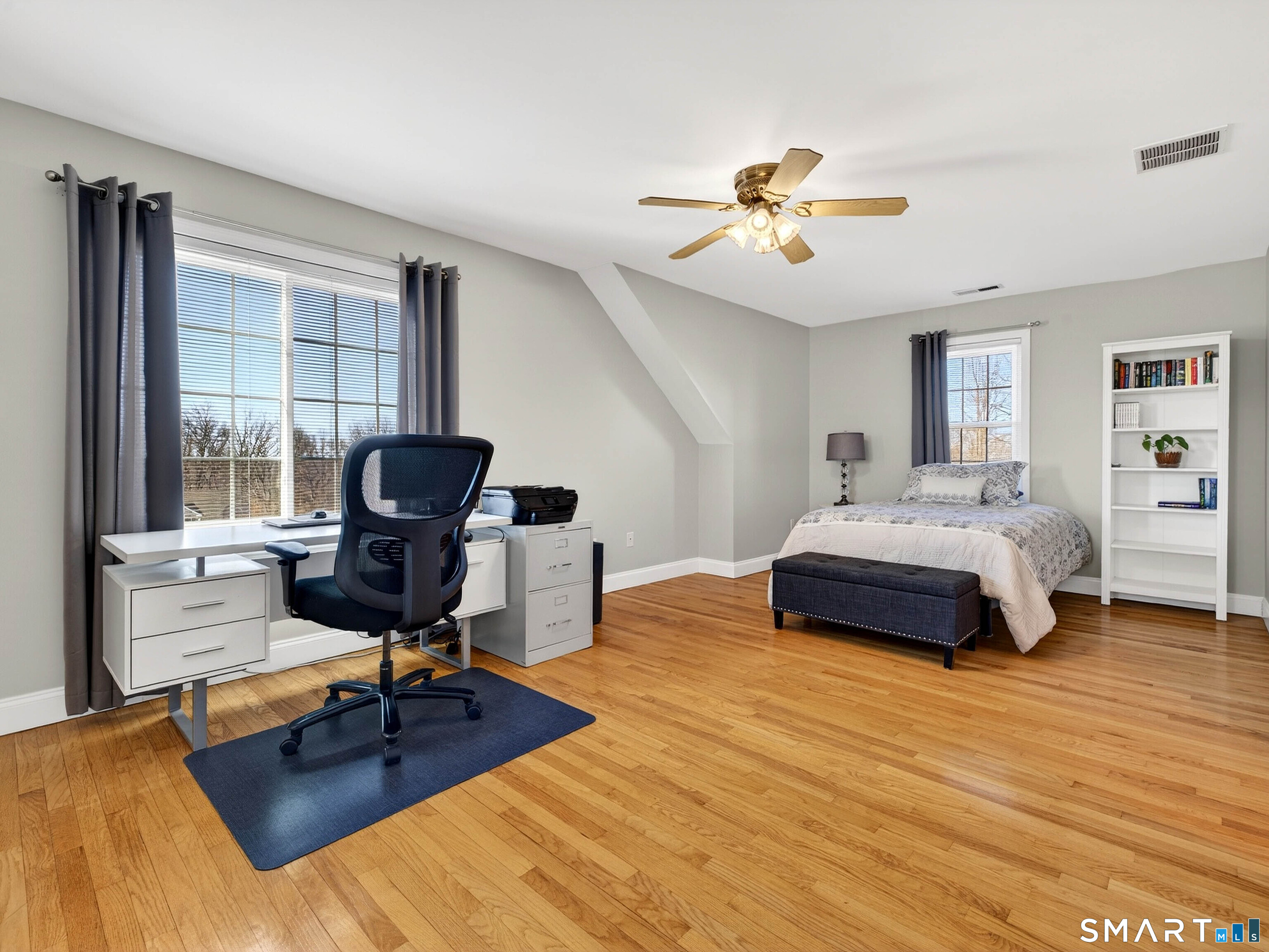 20 Colonial Heights Road East Haven, CT 06473 - Photo 7 of 39 a bedroom with a bed and wooden floor