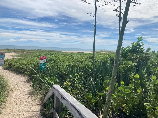 a view of a house with swimming pool