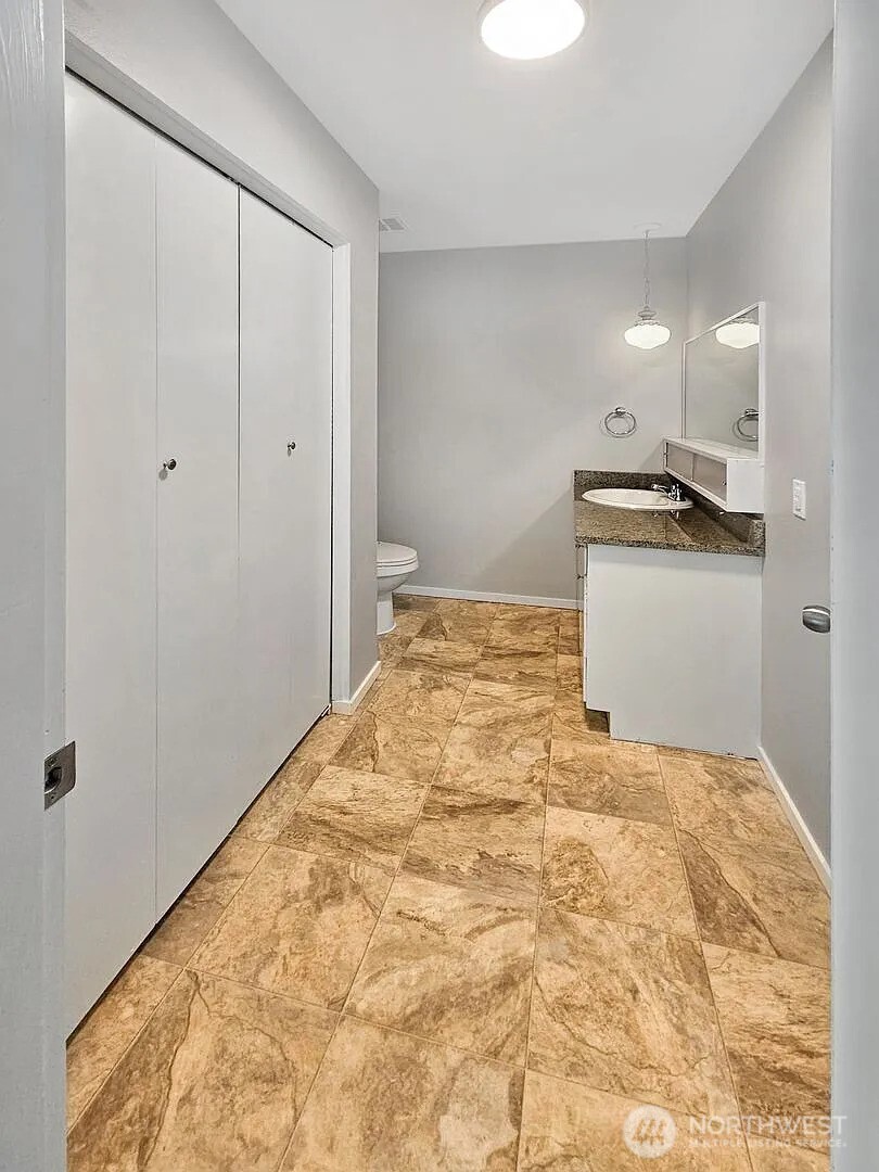 1002 North J Street Tacoma, WA 98403 - Photo 18 of 24 a view of a kitchen with a sink