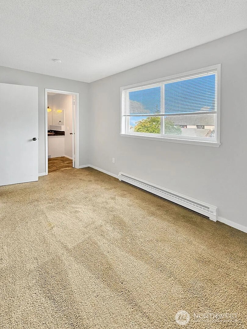 1002 North J Street Tacoma, WA 98403 - Photo 20 of 24 an empty room with a window