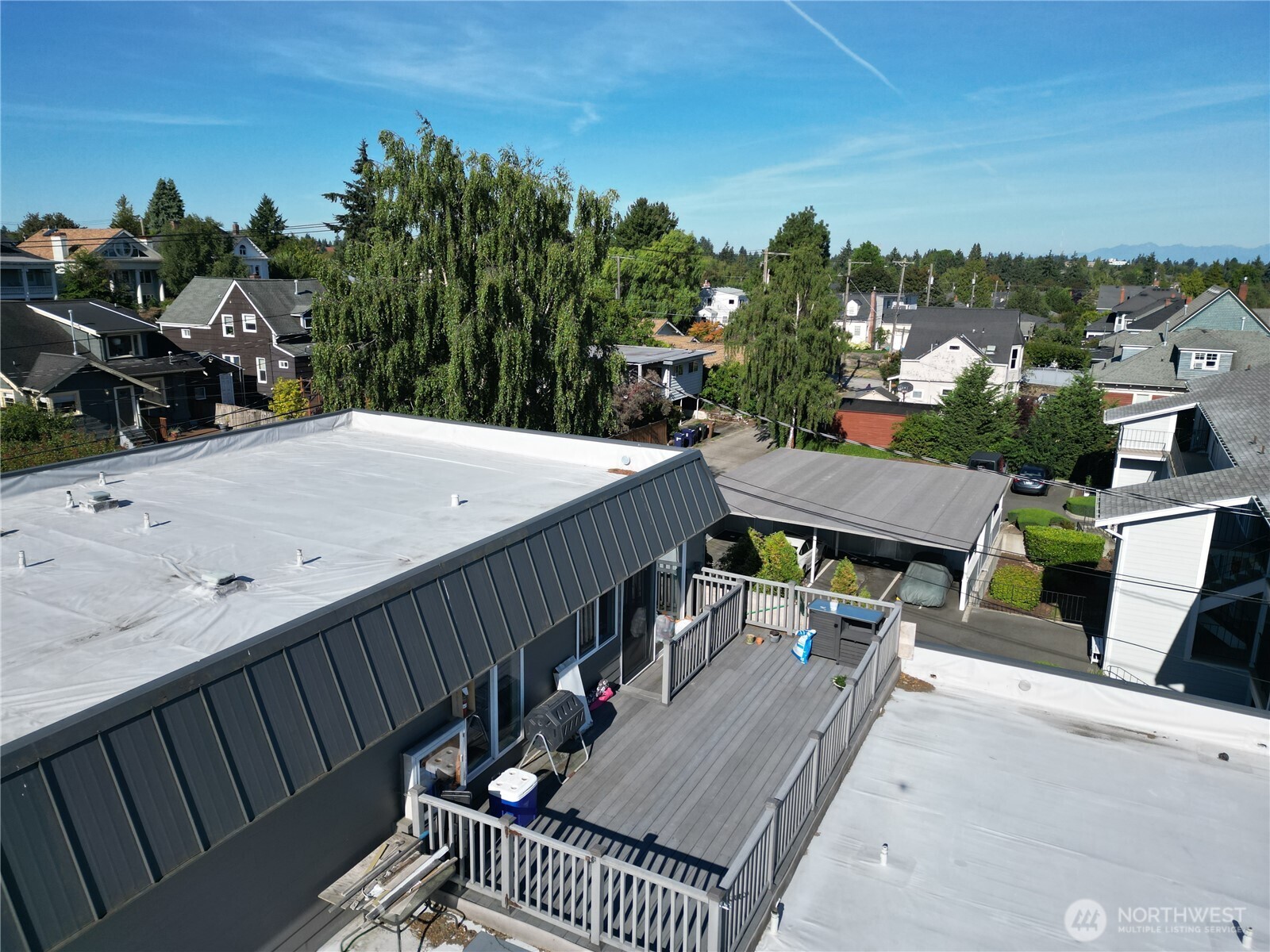 1002 North J Street Tacoma, WA 98403 - Photo 6 of 24 a view of a patio with swimming pool