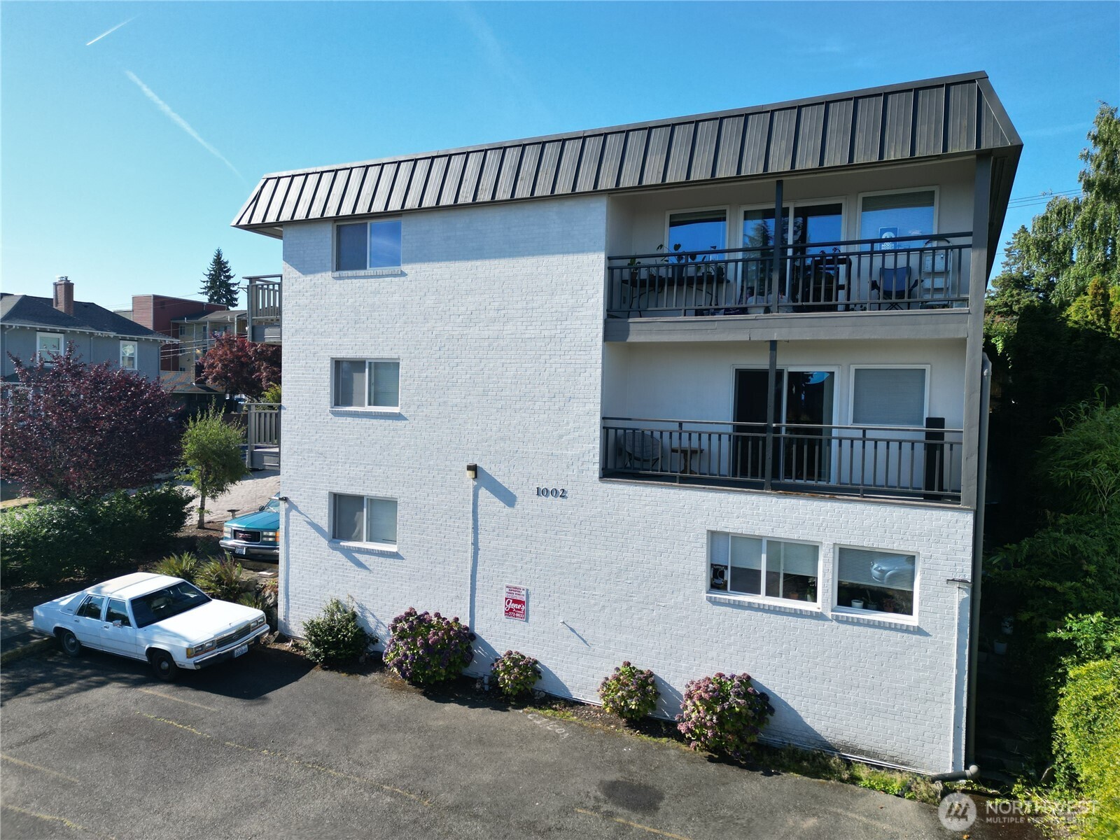 1002 North J Street Tacoma, WA 98403 - Photo 9 of 24 a view of a house with roof deck