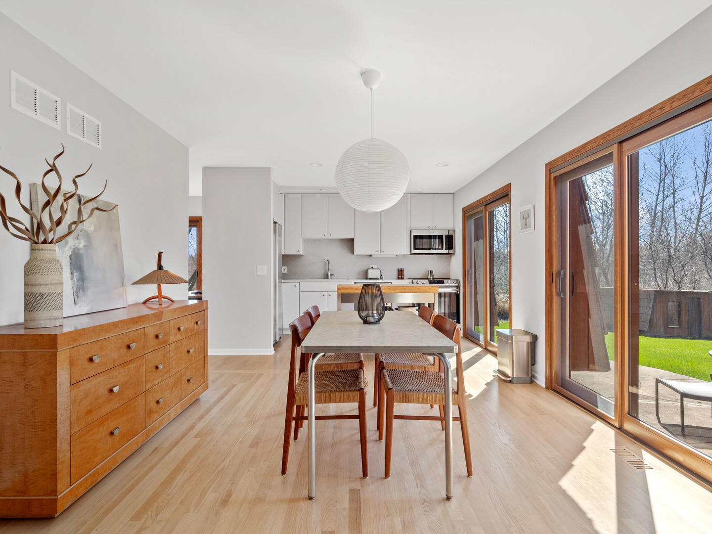21W741 Bemis Road Glen Ellyn, IL 60137 - Photo 12 of 32 a view of a dining room with furniture window and wooden floor