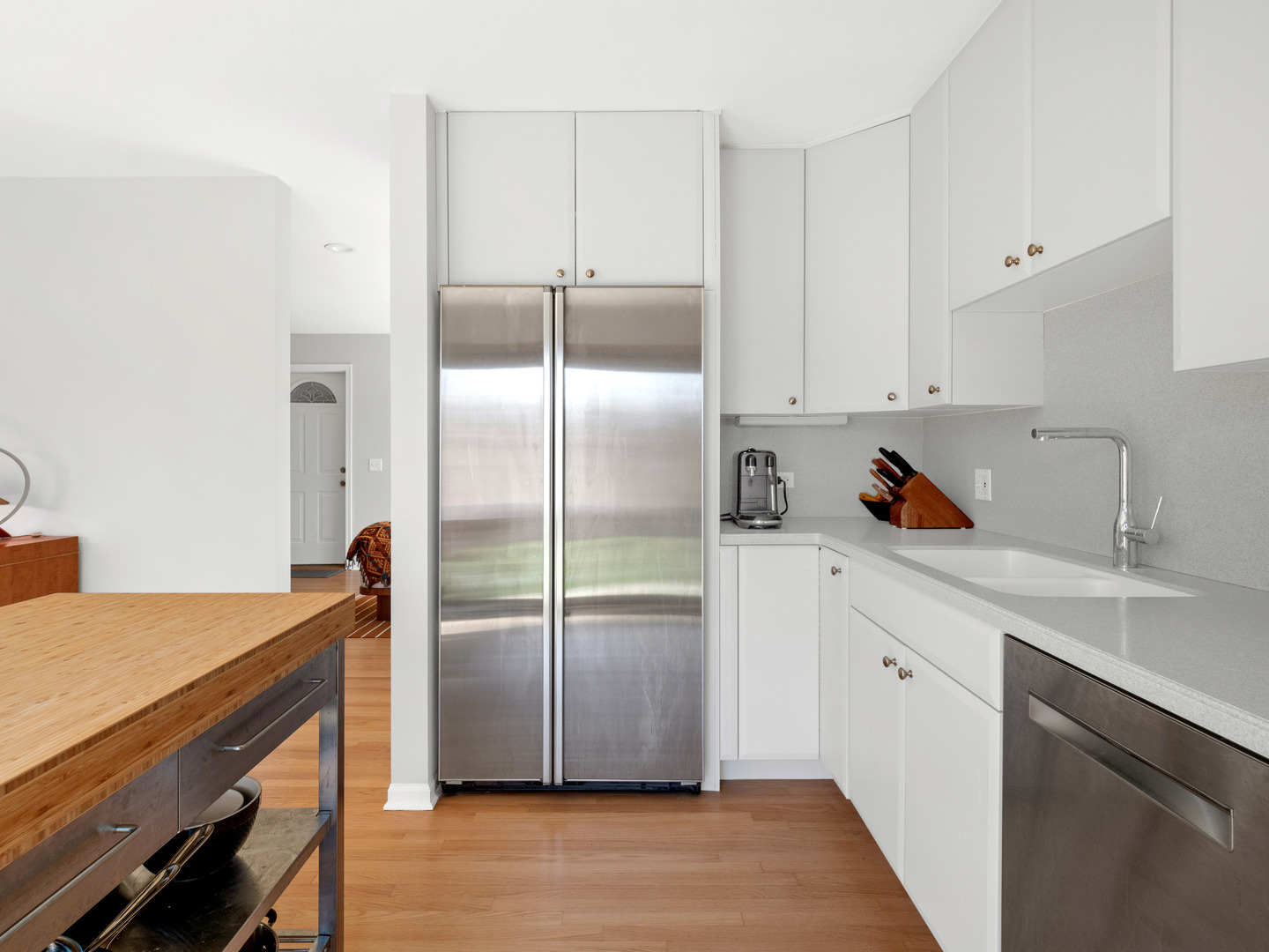 21W741 Bemis Road Glen Ellyn, IL 60137 - Photo 16 of 32 a kitchen with stainless steel appliances a refrigerator and a sink
