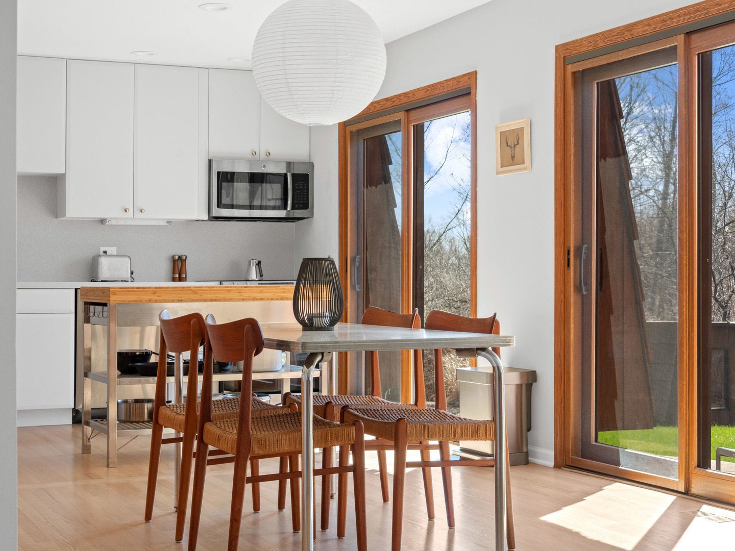 21W741 Bemis Road Glen Ellyn, IL 60137 - Photo 17 of 32 a view of a dining room with furniture window and wooden floor