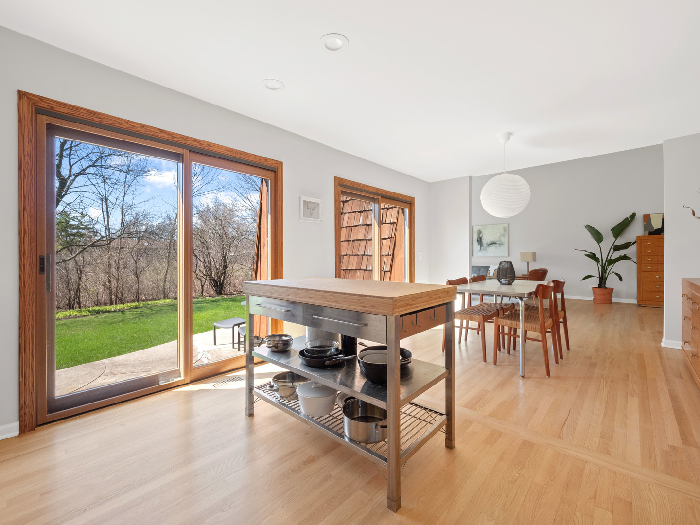 21W741 Bemis Road Glen Ellyn, IL 60137 - Photo 18 of 32 a living room with furniture a table and a large window