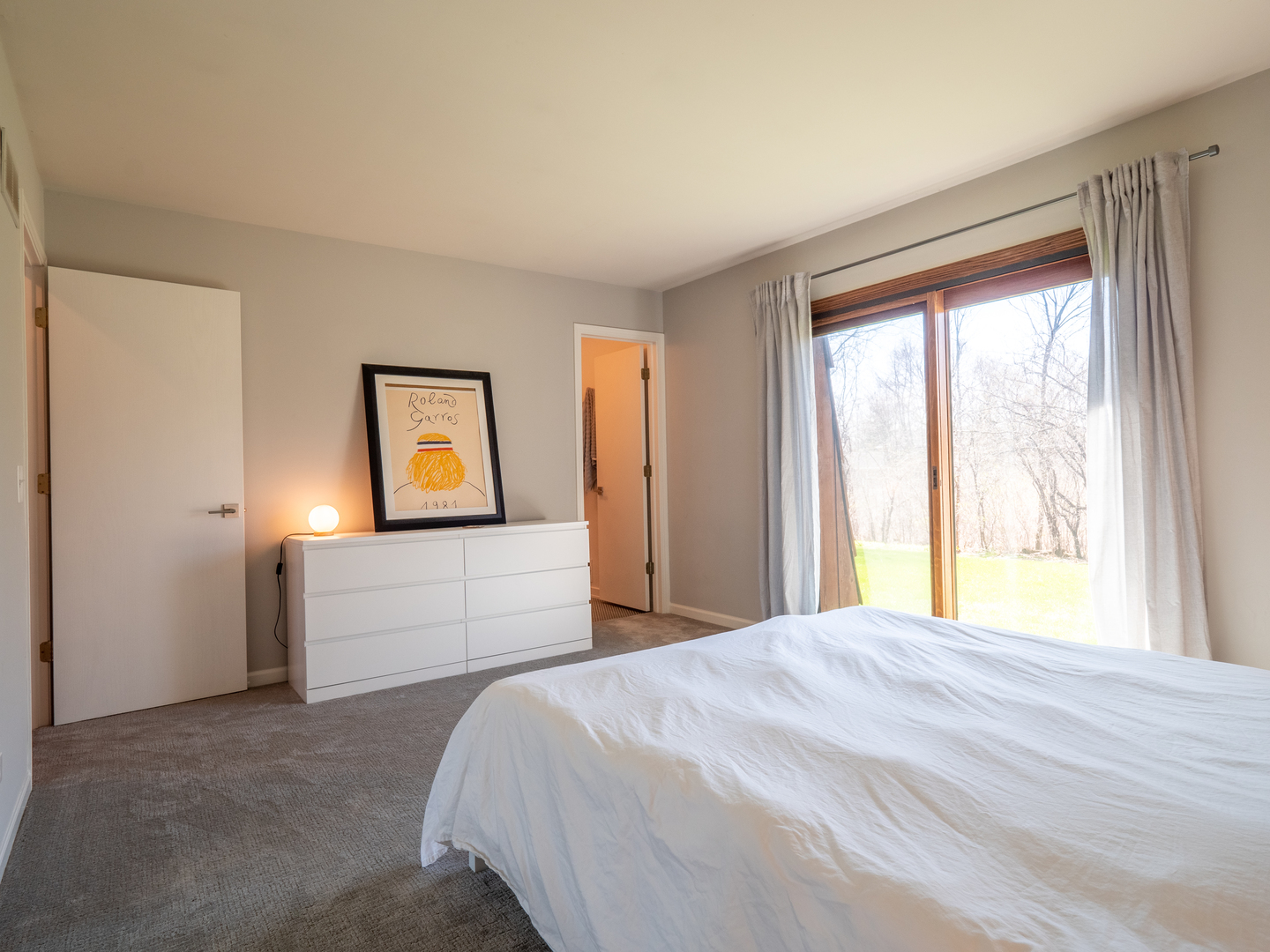 21W741 Bemis Road Glen Ellyn, IL 60137 - Photo 24 of 32 a bedroom with a large bed and a window