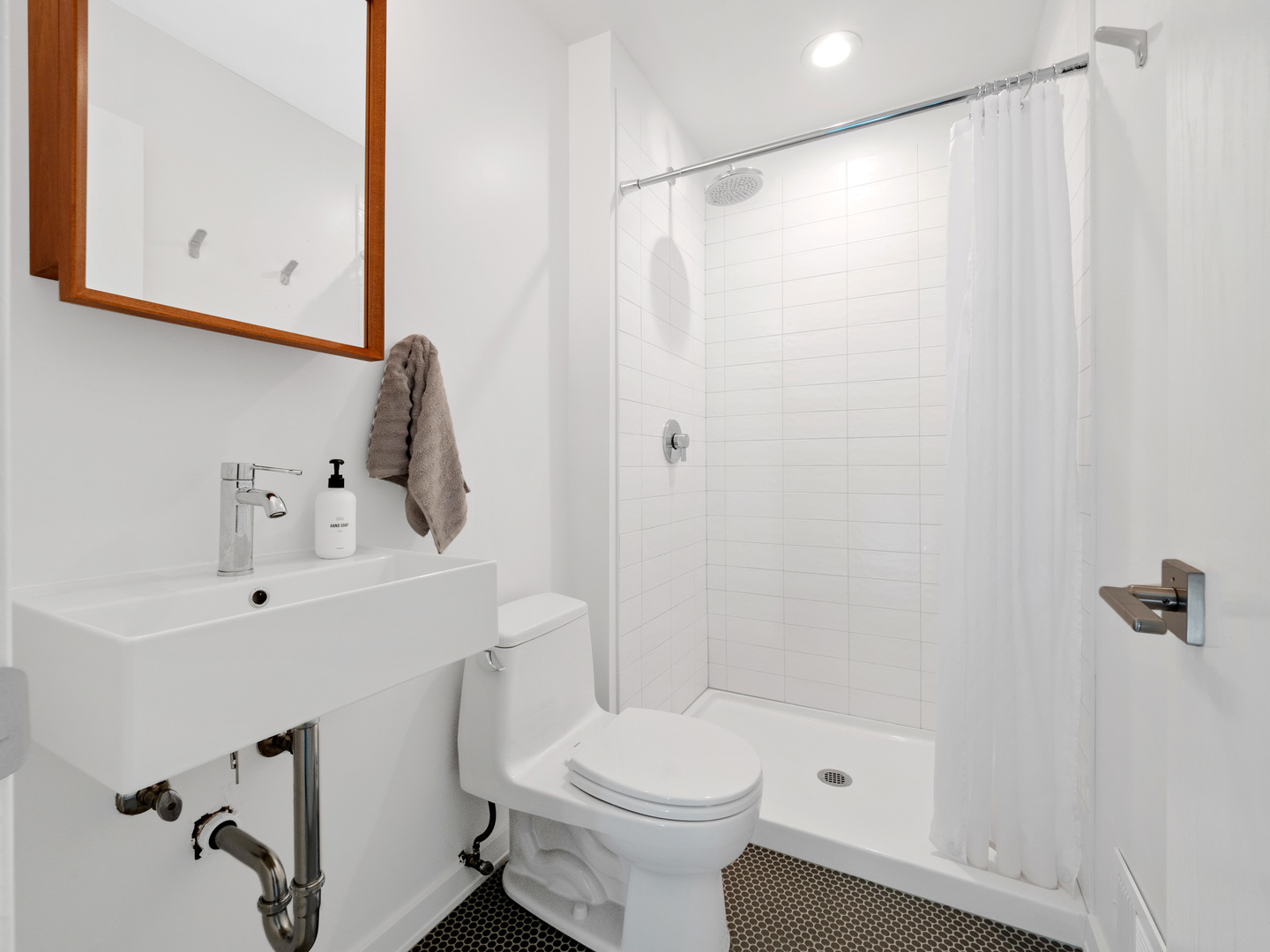 21W741 Bemis Road Glen Ellyn, IL 60137 - Photo 25 of 32 a bathroom with a sink a toilet and shower