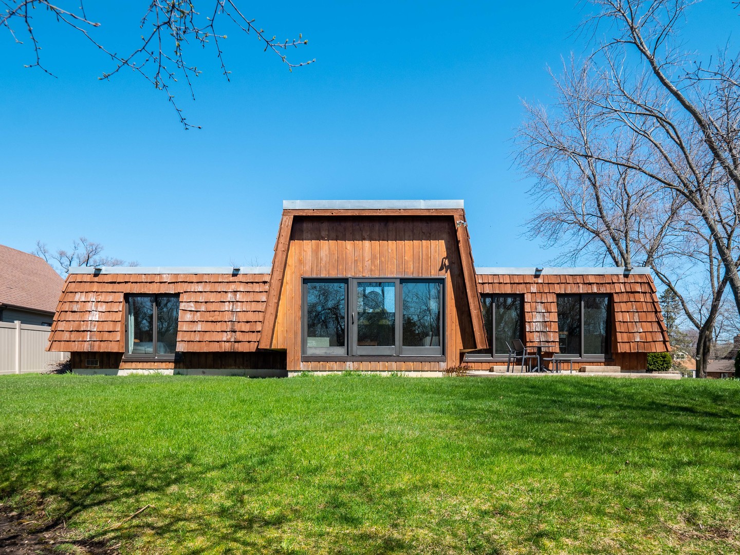 21W741 Bemis Road Glen Ellyn, IL 60137 - Photo 6 of 32 a view of a house with a yard and sitting area