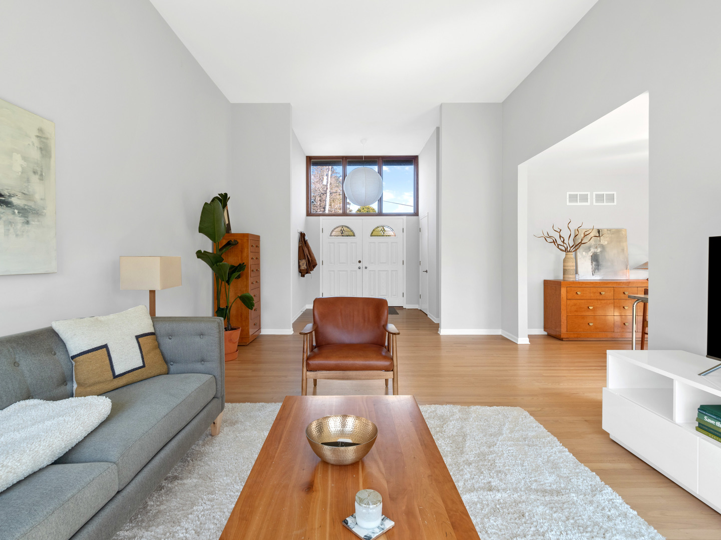 21W741 Bemis Road Glen Ellyn, IL 60137 - Photo 9 of 32 a living room with furniture and wooden floor