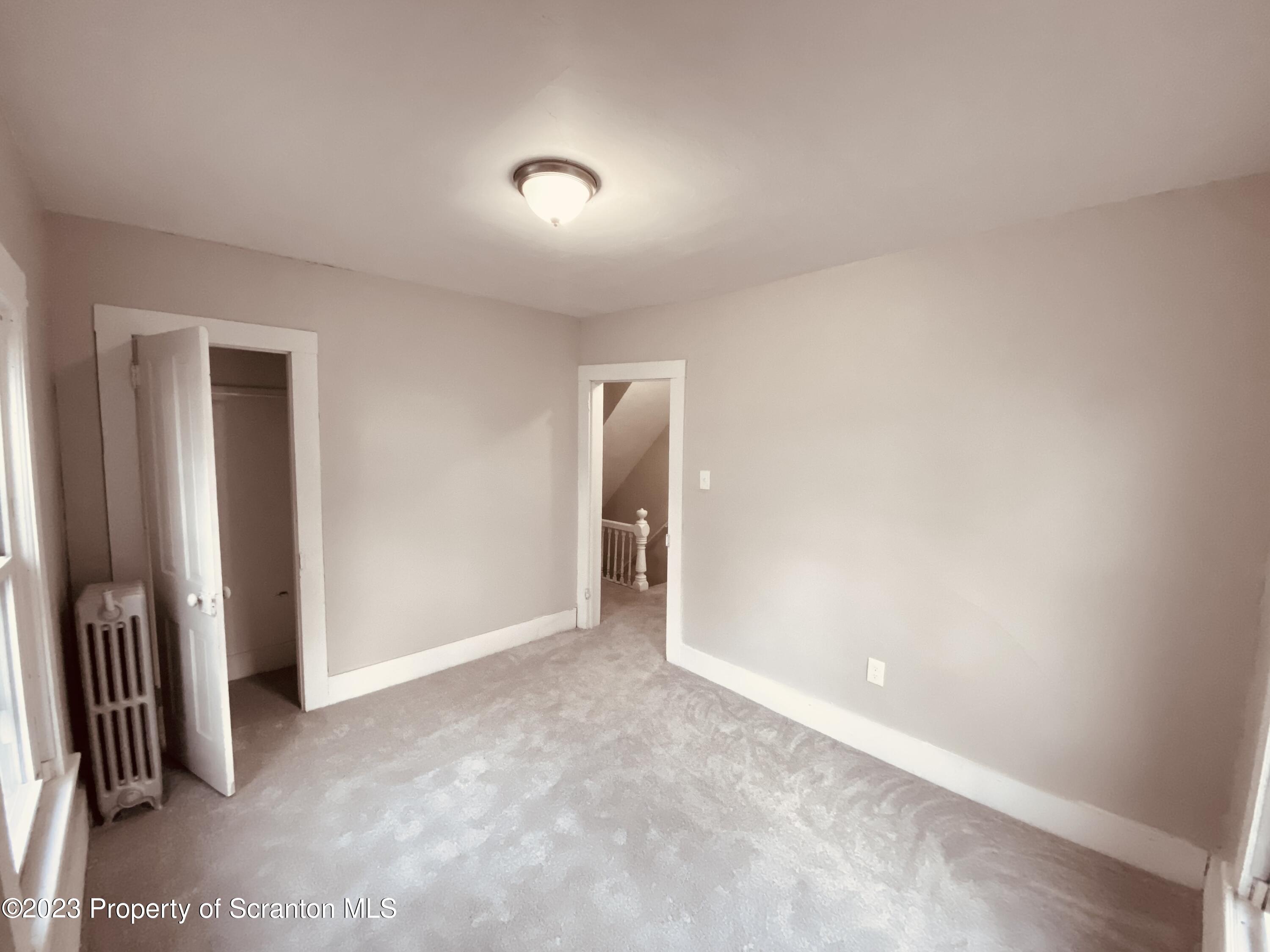 916 South 9th Avenue Scranton, PA 18504 - Photo 12 of 18 an empty room with closet