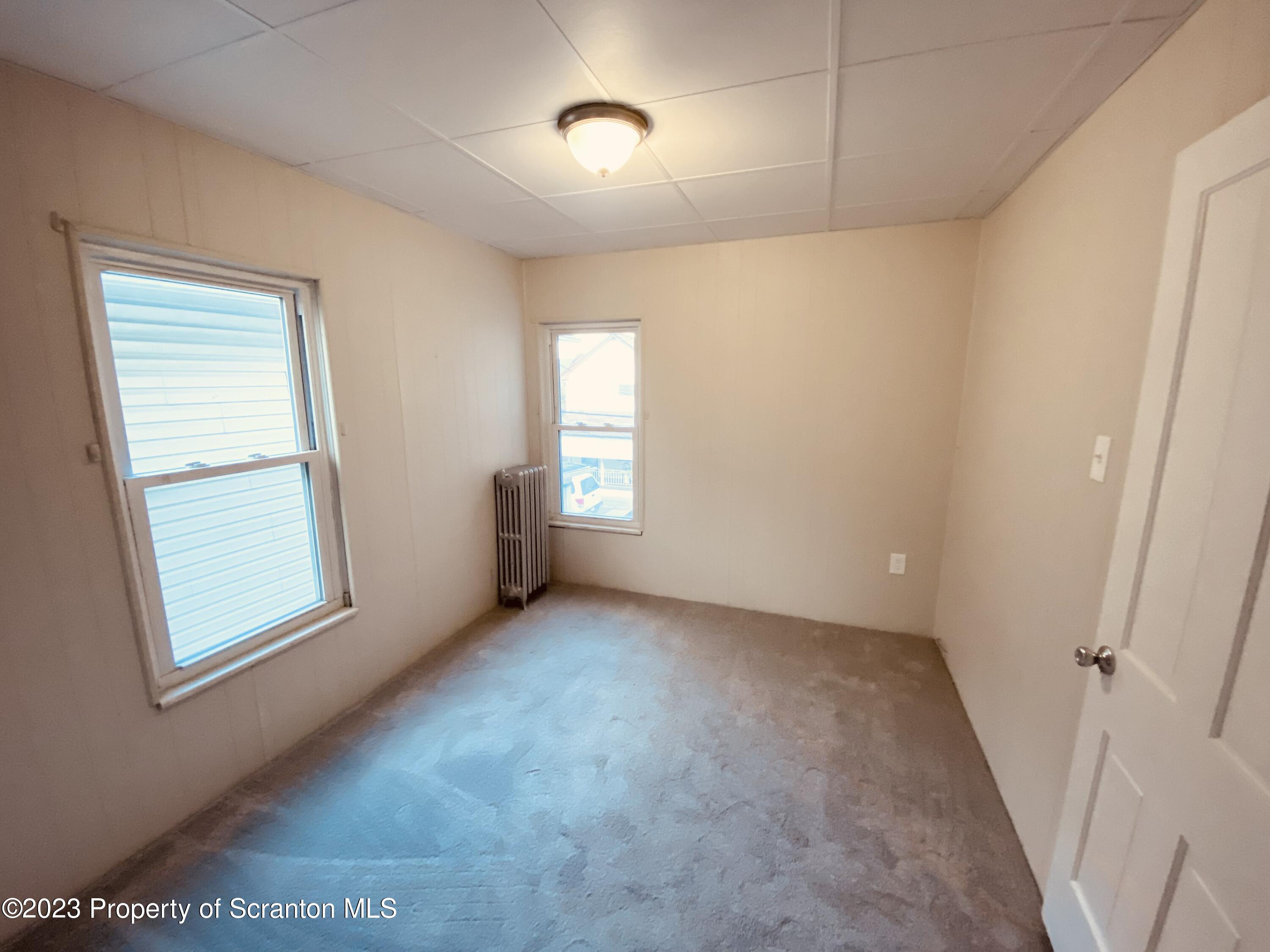 916 South 9th Avenue Scranton, PA 18504 - Photo 14 of 18 a view of an empty room with a window