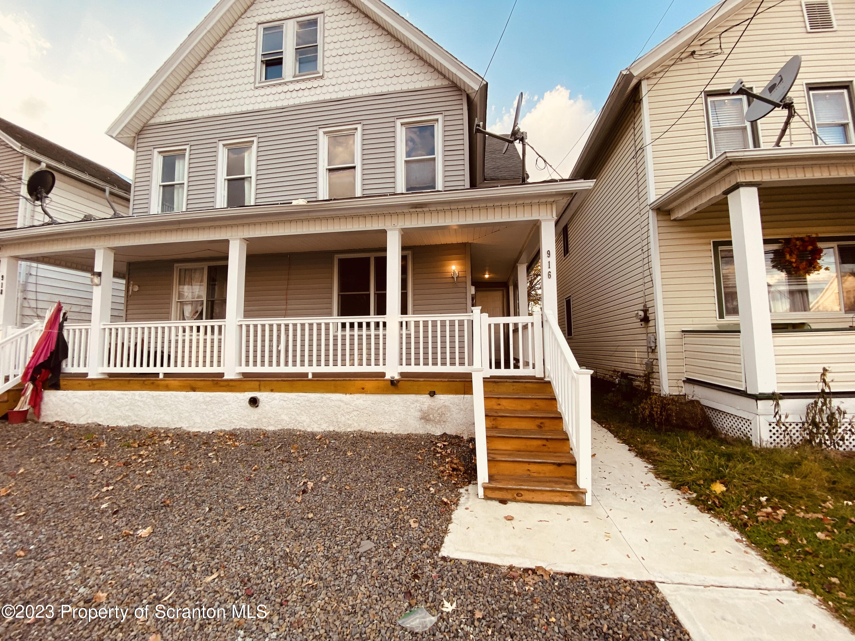 916 South 9th Avenue Scranton, PA 18504 - Photo 2 of 18 a view of a house with wooden floor and fence
