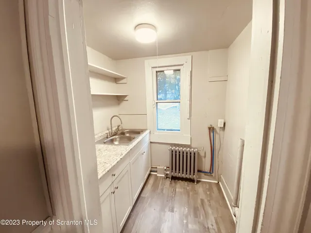 a view of a kitchen from a window