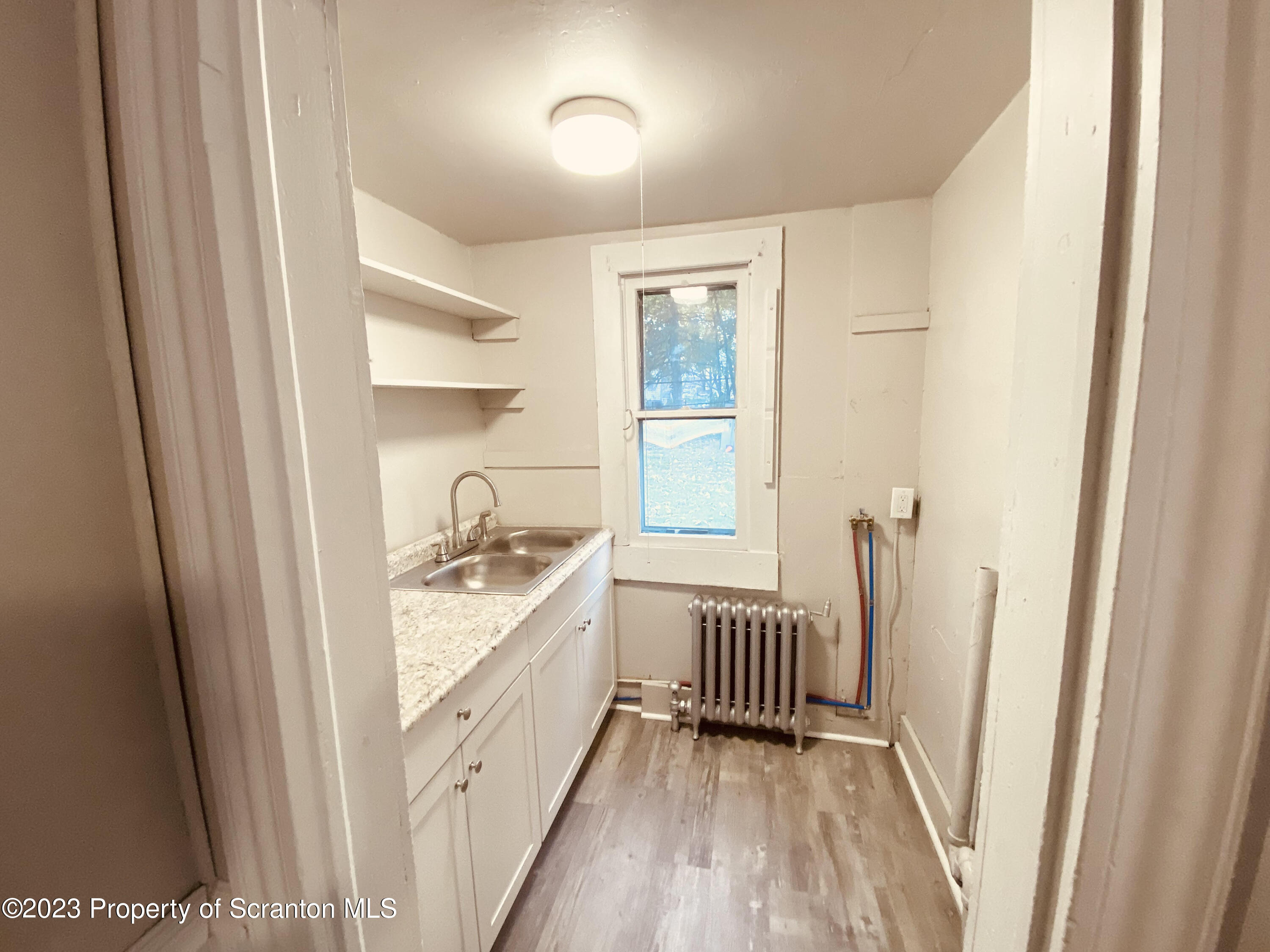 916 South 9th Avenue Scranton, PA 18504 - Photo 9 of 18 a view of a kitchen from a window