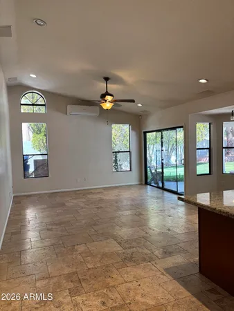 a living room with furniture and window