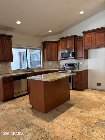 a view of a room with an entryway