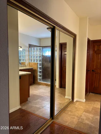 a bathroom with a sink double vanity and a mirror
