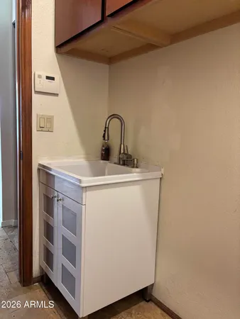 a view of a storage & utility room in a kitchen