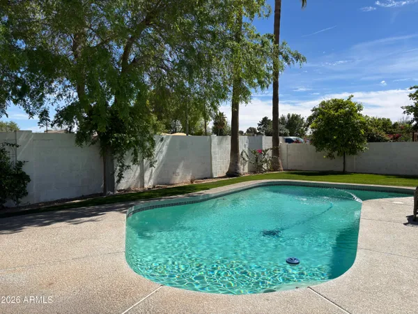 a view of a golf course with a garden