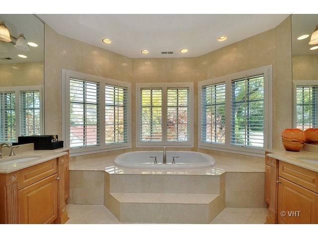 459 Sunset Road Winnetka, IL 60093 - Photo 13 of 16 a kitchen with a sink and large window