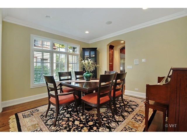 459 Sunset Road Winnetka, IL 60093 - Photo 6 of 16 a dining room with furniture and wooden floor