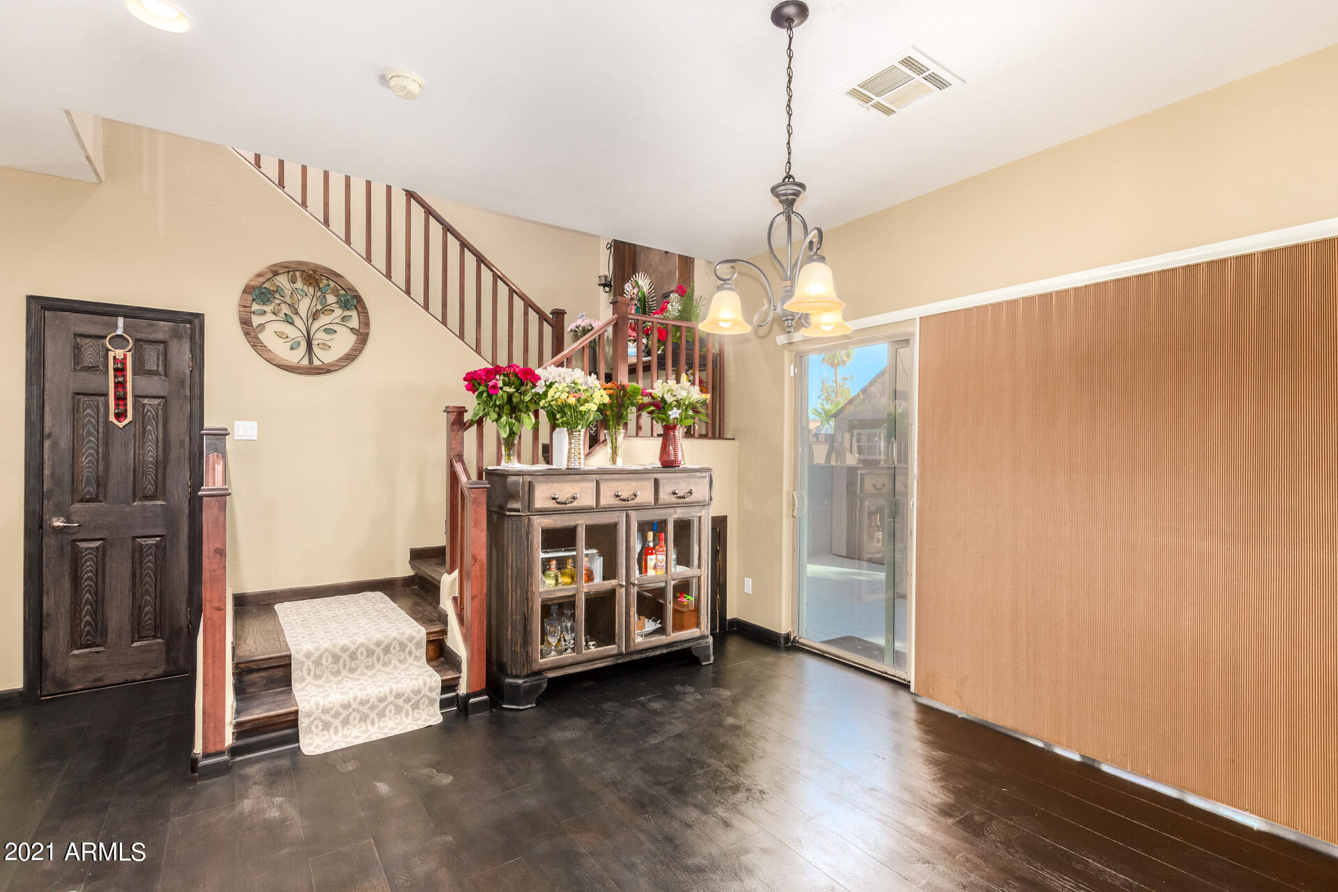 10225 West Camelback Road, Unit 8 Phoenix, AZ 85037 - Photo 14 of 30 a view of an entryway with hardwood