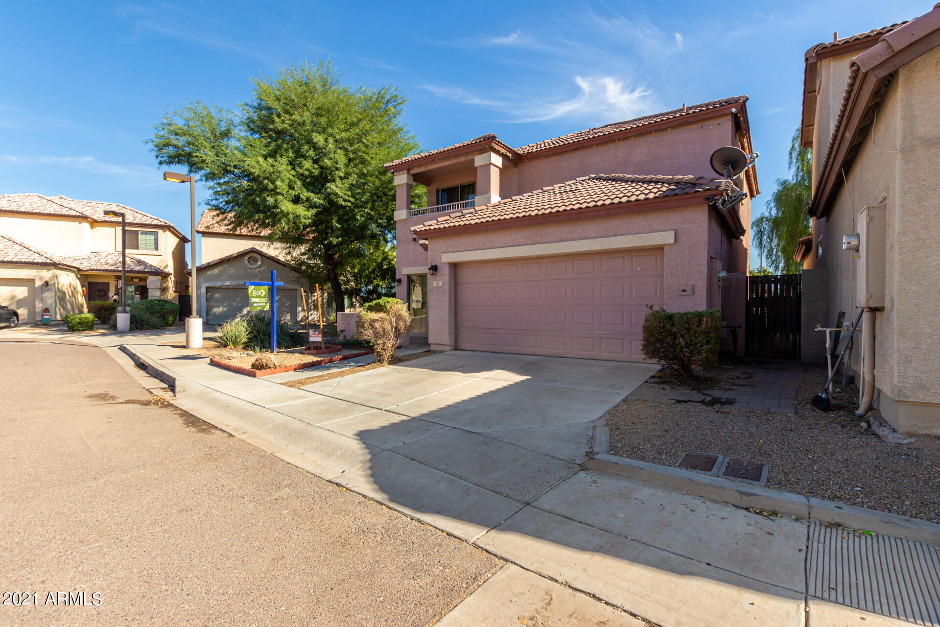 10225 West Camelback Road, Unit 8 Phoenix, AZ 85037 - Photo 2 of 30 a view of the house with a outdoor space
